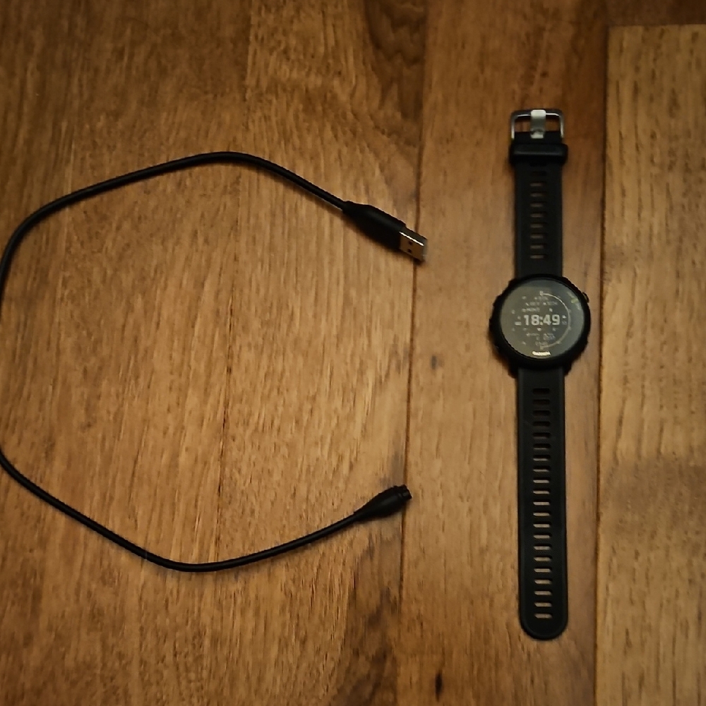Black Smartwatch with Charging Cable